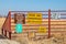 Tall Grass Prairie Oklahoma USA - Signs on metal fence at edge of buffalo reserve in NE Oklahoma - Bison are Dangerous