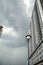 Tall gray buildings and lanterns in a city business district