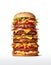 A tall and hearty hamburger on a white background. generative AI