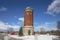 Tall historic Manistique water tower in Michigan