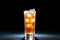 tall iced tea glass backlit with a bright glow