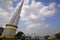 The tall Independence Monument tower of Maha Bandoola Garden with large space of beautiful sky