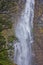 Tall large waterfall in Fiordlands in New Zealand