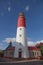 Tall lighthouse on a background of sky