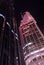 Tall modern fiancial skyscraper buildings at night, low angle view, vertical