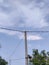 tall power poles and beautiful sky