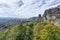 Tall sandy rocks above wild forests