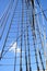 Tall Ship Rigging Ropes over Blue Sky