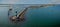 Tall ship and a sailing boats passing through the entrance from the Baltic Sea.