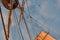 Tall ship sails , airplane and blue  sky