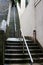 Tall Slippery Wet Stone Steps with Steel Rail