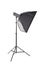 A tall softbox isolated on a white background. Professional photographic equipment. A softbox with a flashlight. Lighting tools.