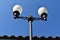 Tall street lamp with frosted glass globes