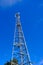 Tall telecommunications mast