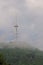 Tall tower with antennae for transmissions on a hill with the forest on the outskirts of Sofia, Bulgaria