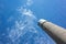 Tall water tower made of gray bricks