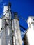 Tall White Grain Storage with Blue Sky