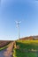 Tall wind turbine on countryside