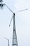 Taller hybrid tower lattice wind turbine build of rolled steel tubular segmented install high up 200 feet over land with 100m