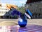 Tallinn Estonia blue  vase  with flowers  and Estonia flag  symbols  on street cafe table top  old town  castle hall square panora