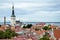 TALLINN / ESTONIA - July 27, 2013: View at the old town of Tallinn, St. Olaf\'s Church in background