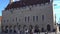 Tallinn, Estonia - MAY, 2018: Turists walking Town Hall Square in the old Tallinn. Estonia.