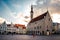 TALLINN, ESTONIA - November 01, 2019: Tallinn town hall building in Town hall square with a beautiful and colourful morning sky