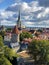 Tallinn,  Estonia : Old city of Tallinn seen from a lookout on Toompea hill. Traditional Red rooftops, Fort turret