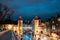 Tallinn, Estonia. People Walking Near Famous Landmark Viru Gate In Street Lighting At Evening Or Night Illumination