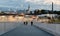 Tallinn Old Town panorama people walking on port promenade on front city medieval church ruffle evening light blurred view from ha