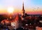 Tallinn old town  at sunset  red roofs medieval panorama   skyline  clouds blue sky sun down summer  weather Baltic sea on horiz