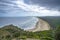 Tallow Beach and Arakwal National Park view from Cape Byron Lighthouse During Dramatic Weather, Byron Bay, NSW Australia.