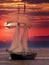 Tallship sailing in the sunset