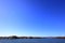 Tama lake and intake tower with Mt. Fuji in autumn