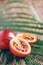 Tamarillo fruit or terong belanda with palm leaves on rattan background. Copy space. Tropical travel, exotic fruit. Vegan and