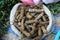 Tamarind fruit pods in a bag at asian food market