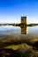 Tamarit tower surrounded by salt lagoons in Santa Pola