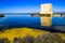 Tamarit tower surrounded by salt lagoons in Santa Pola