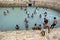 Tamil bathers enjoy a swin in Keerimalai Sacred Bath in the northern Sri Lankan region of Jaffna.