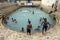 Tamil bathers enjoy a swin in Keerimalai Sacred Bath in the northern Sri Lankan region of Jaffna.