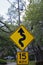 Tampa, Florida / USA - May 5 2018: 15 MPH low angle street sign with the symbol of a squiggly line