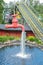 Tampere, Finland - 24 June 2019: Sarkanniemi amusement park. Waterfall in form of faucet