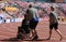 TAMPERE, FINLAND, July 10: Medical assistants helping injured athlete in the IAAF World U20 Championship in Tampere, Finland