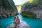 TAMUL, SAN LUIS POTOSI MEXICO - January 6, 2020:young women posing in River amazing crystalline blue water of Tamul waterfall