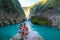 TAMUL, SAN LUIS POTOSI MEXICO - January 6, 2020:young women posing in River amazing crystalline blue water of Tamul waterfall