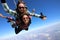 Tandem parachute jump. Beautiful Brazilian woman