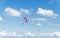 A tandem paraglider flight against a beautiful blue sky. Top view of the embers in the Beskid MaÅ‚y. A popular place in Silesia.