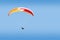 Tandem paraglider free gliding in deep blue sky