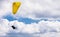 Tandem paragliding flight in clouds