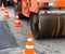 Tandem road roller and traffic cones on the road construction